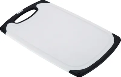 A white and black cutting board is shown from a diagonal angle against a white background.