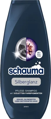 A dark blue bottle of Schauma shampoo with silver and purple accents.