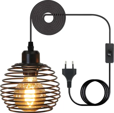A black industrial-style pendant light with a coiled cord, a plug, and a switch against a white background.