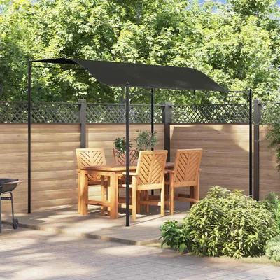 An outdoor patio scene with a wooden table and chairs set up under a black canopy, surrounded by greenery and a wooden fence.