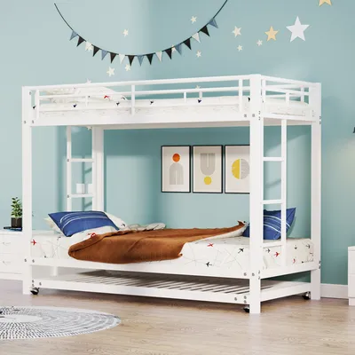 A white metal bunk bed with a pull-out trundle bed is set up in a child's bedroom with blue walls decorated with stars and a banner.