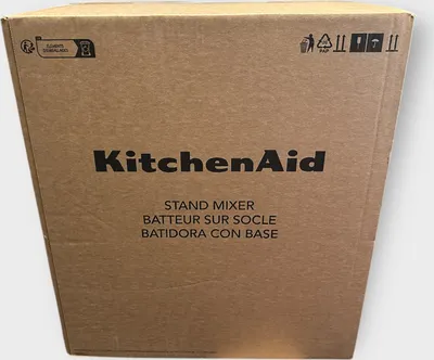 A cardboard box for a KitchenAid stand mixer.