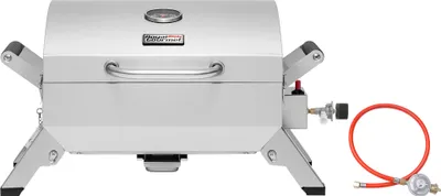 A silver portable gas grill with a red hose and regulator is shown against a white background.