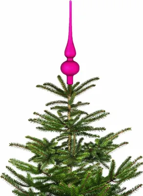 The top of a Christmas tree with a pink tree topper.