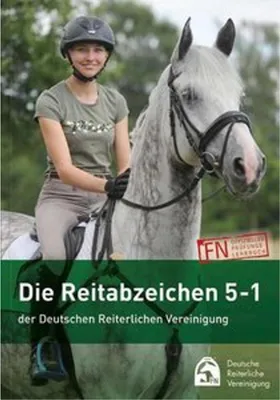 A woman riding a horse.