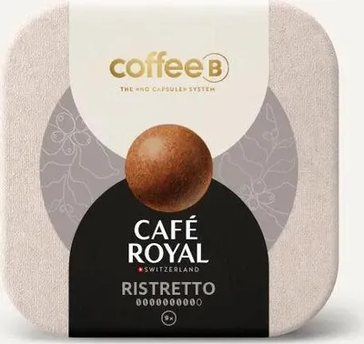 A coffee capsule package with a coffee bean on top.