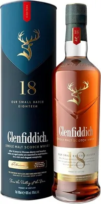A bottle of Glenfiddich 18 Year Old Single Malt Scotch Whisky and its cylindrical presentation box.