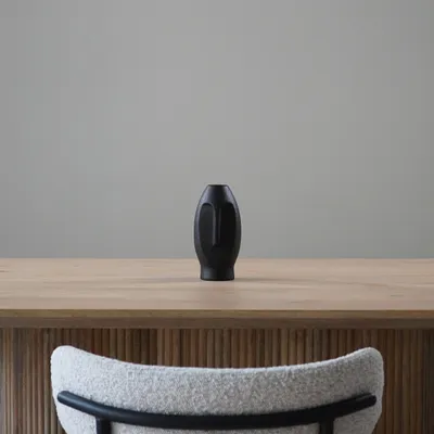 Produktbild von QUVIO Vase - Gesicht - Keramik - Dekoration - Blumenvase - Vase - Vasen - Schwarz - 8 x 8 x 18 cm (lxbxh)