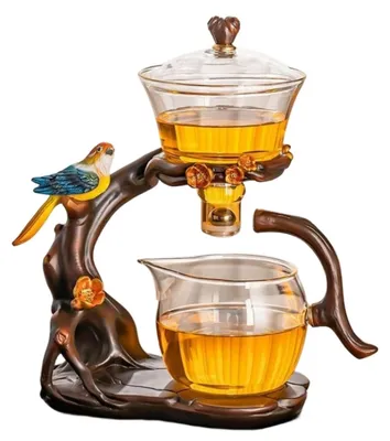 Imagen del producto de Tetera de vidrio creativa con infusor y antidesborde