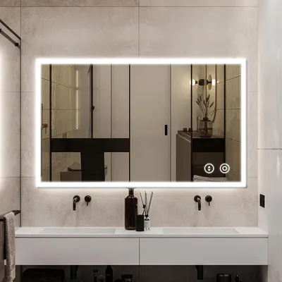 A modern bathroom with a large illuminated mirror above a double vanity.