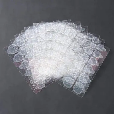 Immagine prodotto di Adesivi per unghie in plastica, a doppia faccia, 10 fogli, trasparenti, ecologici, con forte adesivo. Unghie finte
