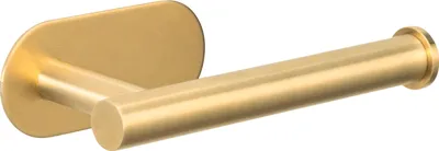 A gold-colored toilet paper holder mounted on a wall.