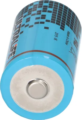 A single battery is shown from a low angle, with the positive terminal facing the viewer.