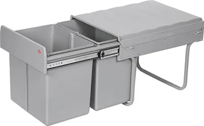 A gray pull-out trash can system with two compartments, shown from a slightly elevated front-left angle against a white background.