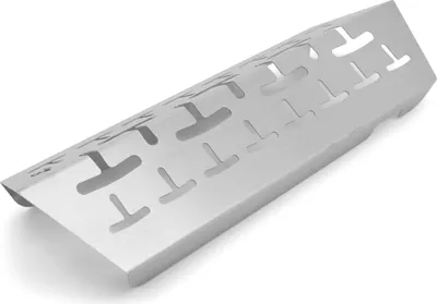 A product shot of a metal heat deflector with cutouts.