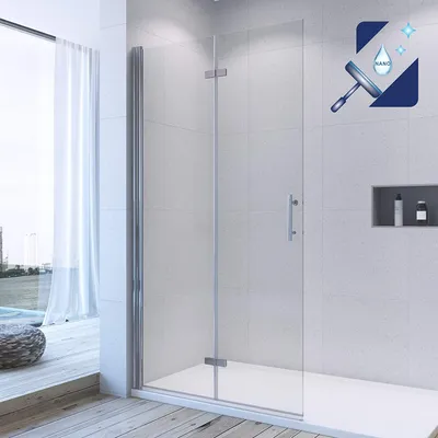 A modern bathroom with a glass shower enclosure.