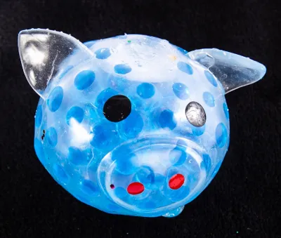 Produktbild von Antistress Schwein Quetschball - Knetfigur mit Kugeln zum Stressabbau & Spielen für Kinder
