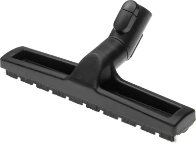 A close-up shot of a black vacuum cleaner nozzle.