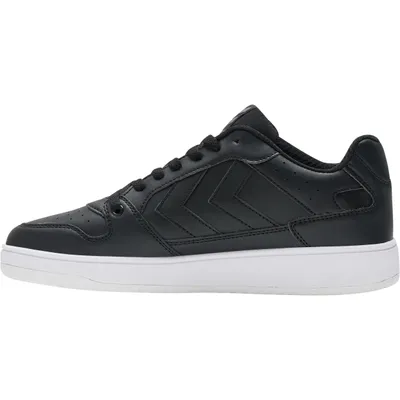 A side view of a black Hummel sneaker with a white sole against a white background.