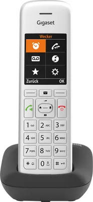 A white Gigaset cordless phone with a black charging base, shown from the front.