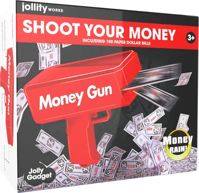 The image shows the packaging of a "Money Gun" toy, with the toy itself prominently displayed, shooting fake dollar bills.