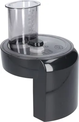A black food processor attachment with a clear measuring cup on top, set against a white background.