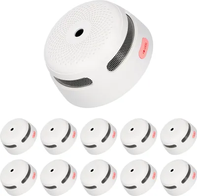 A group of white smoke detectors are displayed against a white background. One smoke detector is prominently featured at the top, while ten others are arranged in two rows below it.