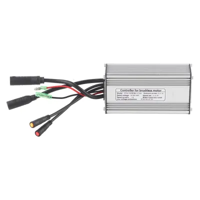 A silver electronic controller device with multiple cables and connectors, placed on a white background.