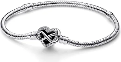 A silver bracelet with a heart-shaped charm featuring an infinity symbol and small stones.