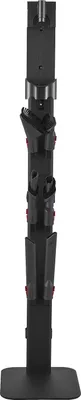 A black vacuum cleaner stand with multiple accessory holders.