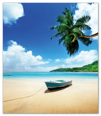 Produktbild von Wallario Herdabdeckplatte aus Glas, Größe 52 x 60 cm 1-teilig, Motiv Urlaub am Palmenstrand unter Palmen mit Fischerboot