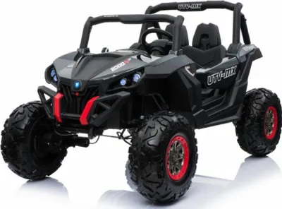 A black and red UTV-MX buggy for children, shown from a front-side angle against a white background.