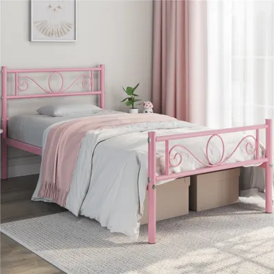 A pink metal twin bed with bedding in a bedroom setting.