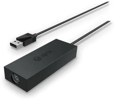 A black Xbox digital TV tuner with a USB cable attached, shown on a white background.