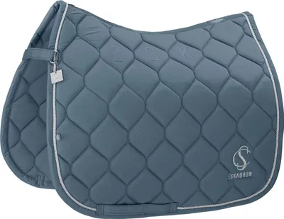 A close-up, studio shot of a blue horse saddle pad.