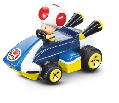 A toy Toad character from Mario Kart driving a blue and white kart with yellow accents.
