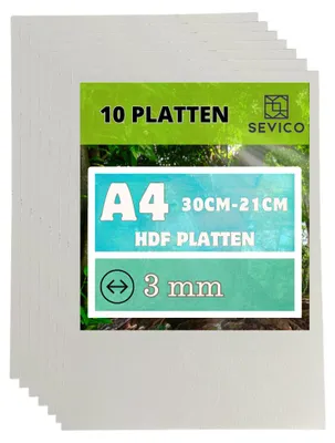 A stack of white HDF boards with a label showing product details.