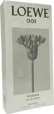 The image shows the packaging of a perfume bottle.