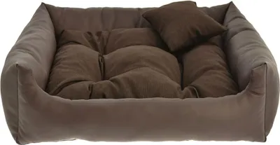 A brown dog bed with cushions.