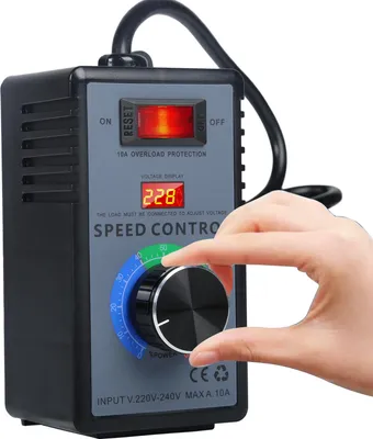 A hand is shown adjusting the knob on a speed control device.