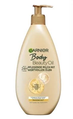 A bottle of Garnier Body Beauty Oil lotion with a pump dispenser, shown against a white background.