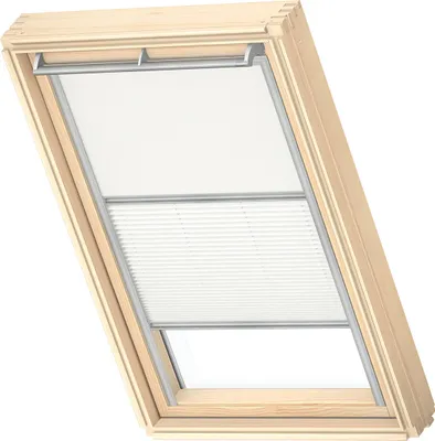 A wooden framed skylight with a white pleated blind partially covering the glass.
