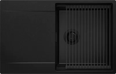 A top-down view of a black kitchen sink with a drying rack.