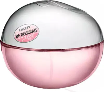 A round, pink and silver perfume bottle with a label.