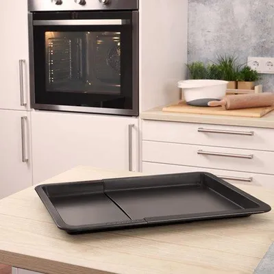 Produktbild von Verstellbare Backblech, ausziehbar, mit Antihaftbeschichtung, 33-52 cm, aus Kohlenstoffstahl mit Beschichtung für den Backofen