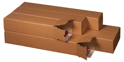 Several cardboard shipping boxes are stacked and arranged diagonally.