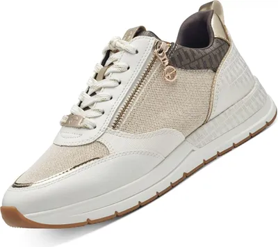 A studio shot of a single women's sneaker.