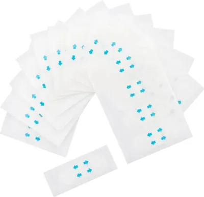 A fan of white lifting patches with blue arrows, arranged on a white background.
