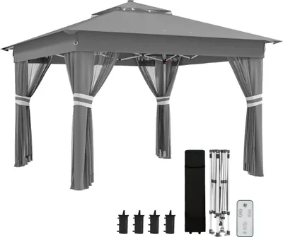 A gray gazebo with curtains and accessories laid out separately.