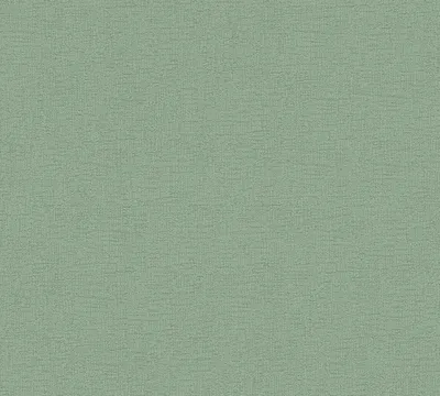 A close-up, textured view of a green wallpaper.